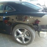 Photographs of a 2014 Chevrolet Camaro that was in an accident and repaired by Elite Paint & Body Shop in West Palm Beach Florida